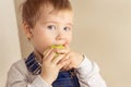 Boy holding an apple Royalty Free Stock Photo