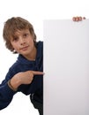 Boy holding blank white sign Royalty Free Stock Photo