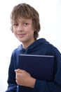 Boy holding book