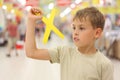 Boy holding boomerang toy