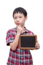 Boy holding chalkboard over white Royalty Free Stock Photo