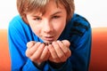 Boy holding coffee grains