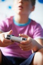 Boy Holding Controller Playing Video Game Royalty Free Stock Photo