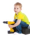 Boy holding electric screwdriver