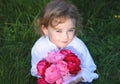 Boy holding flowers