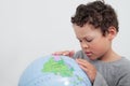 Boy holding a globe stock photo Royalty Free Stock Photo