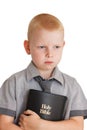 Boy holding Holy Bible Royalty Free Stock Photo