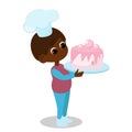 The boy is holding a huge cake in his hands. The child is happy and wearing a chef\'s hat. Character design. Royalty Free Stock Photo