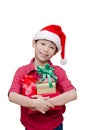 Boy holding many present boxes and smiles Royalty Free Stock Photo