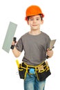 Boy holding notched and spatula Royalty Free Stock Photo
