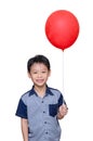 Boy holding red balloon Royalty Free Stock Photo