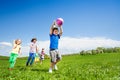 Boy holding rocket carton toy and children running Royalty Free Stock Photo