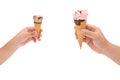 Boy holding a small ice cream cone and man holding a big one with clipping-path Royalty Free Stock Photo