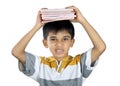 Boy Holding the Textbook with Expression Royalty Free Stock Photo