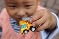 A boy holding a toy fire truck. Royalty Free Stock Photo