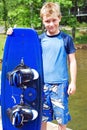 Boy Holding Wakeboard