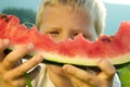 Boy holding watermelon Royalty Free Stock Photo