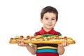 Boy holds a long sandwich