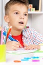 Boy homework at table Royalty Free Stock Photo