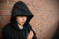 Boy in hooded top