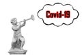 Boy with horn statue and Covid-19 text