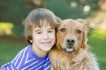 Boy Hugging Dog Royalty Free Stock Photo