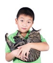Boy hugging with his cute tiger cat isolated on white background Royalty Free Stock Photo
