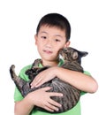 Boy hugging with his cute tiger cat isolated on white background Royalty Free Stock Photo