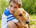 Boy hugging his dog Royalty Free Stock Photo