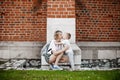 The boy is hugging his mother. The son kisses his mother. Royalty Free Stock Photo
