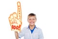 Boy with a hurray boo foam hand. Young fan Royalty Free Stock Photo