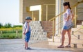 Boy with Ice Cream Being Scolded by Angry Mother