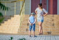 Boy with Ice Cream Being Scolded by Angry Mother Royalty Free Stock Photo