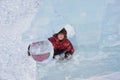 Boy in ice sculpture, urban esplanad