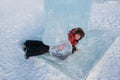 Boy in ice sculpture, urban esplanad