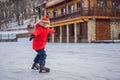 Boy ice skating for the first time Royalty Free Stock Photo