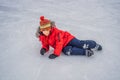 Boy ice skating for the first time Royalty Free Stock Photo