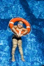 Boy in inflatable ring