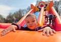 Boy inflatable slide Royalty Free Stock Photo