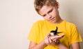 Boy with injured swallow bird in his hands close up. Saving wild