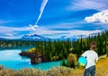 Boy in jeans with a globe in his hands Royalty Free Stock Photo