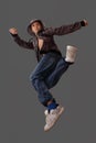 Boy in a jump simulates a dance element