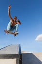 Boy in a jump on a skateboard Royalty Free Stock Photo