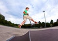 Boy jumping in the air with his Royalty Free Stock Photo