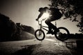 Boy jumping on bmx inside splashes Royalty Free Stock Photo