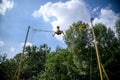 The boy is jumping on a bungee trampoline. A child with insuranc Royalty Free Stock Photo