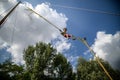 The boy is jumping on a bungee trampoline. A child with insuranc Royalty Free Stock Photo