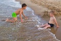 Boy jumping freedom in the beach 2021 play Royalty Free Stock Photo