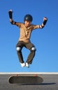 Boy Jumping High from Skateboard Royalty Free Stock Photo