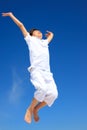 Boy jumping in midair Royalty Free Stock Photo